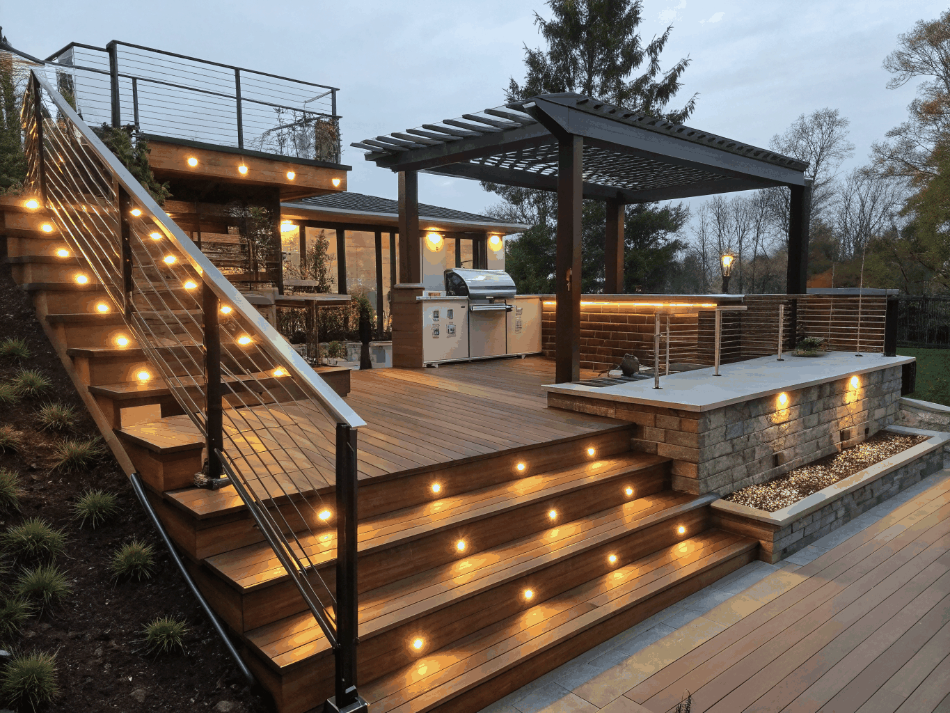Elevated composite deck with a pergola and stairs to the yard